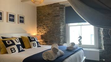 2 dormitorios, tabla de planchar con plancha, wifi gratis y ropa de cama