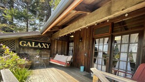 A wooden exterior with a sign reading "GALAXY". - Rendezvous Mendocino (Gualala)