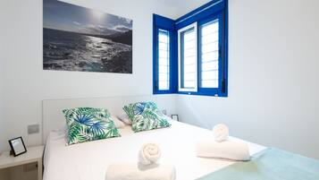 2 dormitorios, tabla de planchar con plancha, Internet y ropa de cama