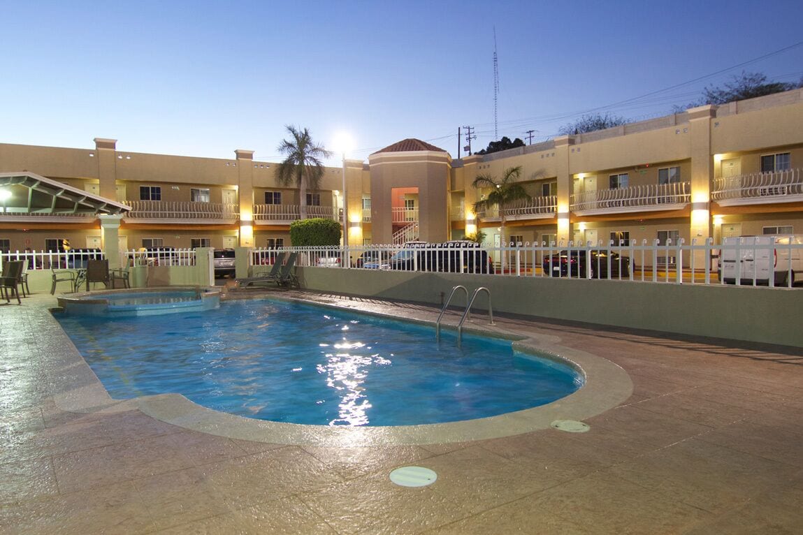 Outdoor pool, open 8:00 AM to 10:00 PM, pool umbrellas, sun loungers