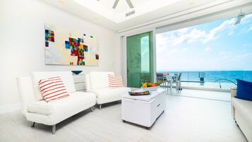 Luxury Condo, 1 King Bed with Sofa bed, Ocean View, Ground Floor | Living area | 55-inch Smart TV with cable channels, TV