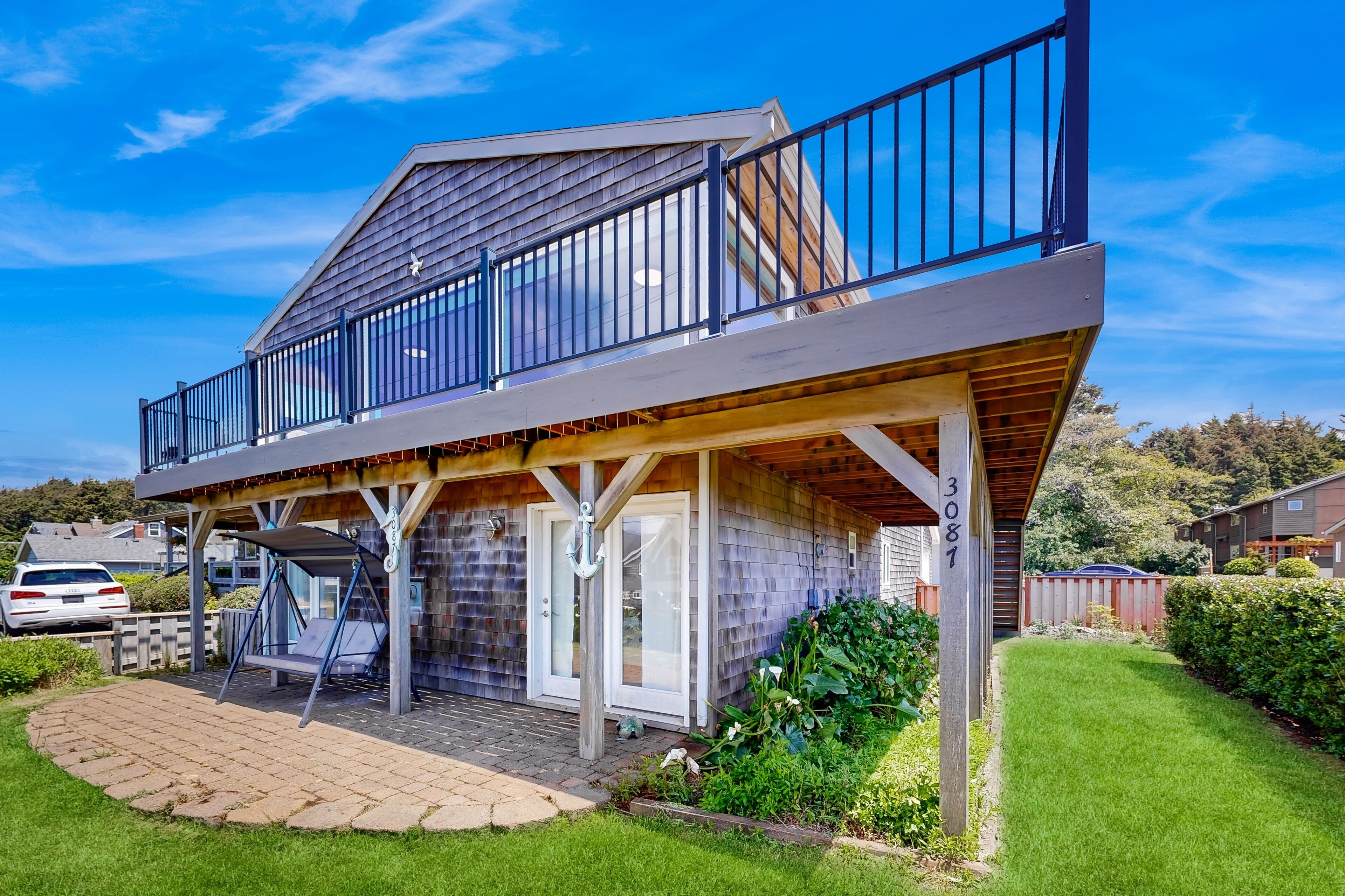 Ocean-view home - dog-friendly, private W/D, four fireplaces - steps to beach