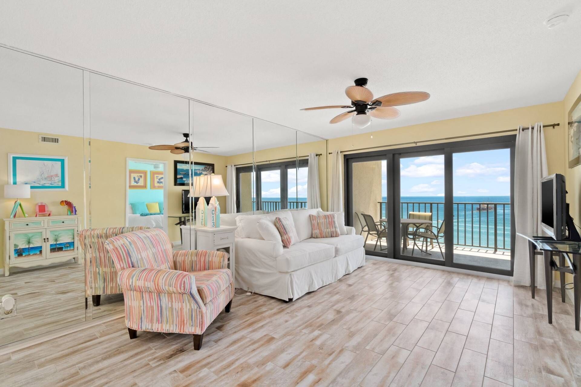 Recently updated, beachfront condo with a private balcony in a gated resort with amenities galore