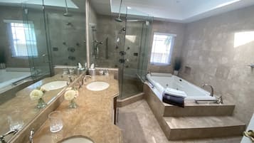 Combined shower/bathtub, jetted bath, hair dryer, towels