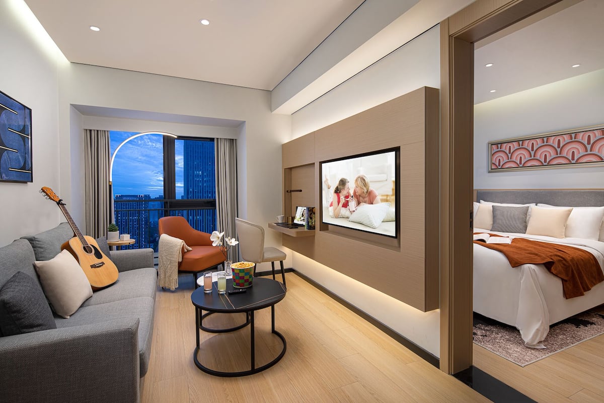 Deluxe Room, 1 Bedroom | 1 bedroom, down comforters, desk, laptop workspace