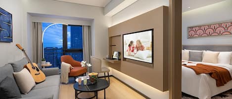 Departamento Premier, 1 habitación | Edredón, escritorio, espacio para trabajar con laptop y insonorización
