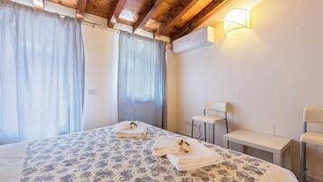 1 Schlafzimmer, BĂŒgeleisen/BĂŒgelbrett, kostenloses WLAN, BettwĂ€sche