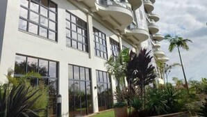 A modern building with multiple balconies and large windows. - Stay.Plus Nova Apartment Westlands (Nairobi)