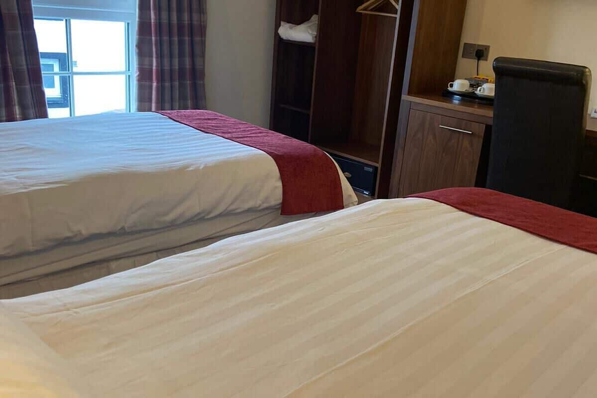 deluxe twin room | in-room safe, blackout curtains, soundproofing, iron/ironing board