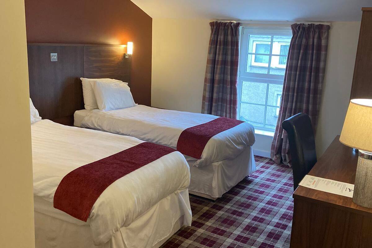 deluxe twin room | in-room safe, blackout curtains, soundproofing, iron/ironing board