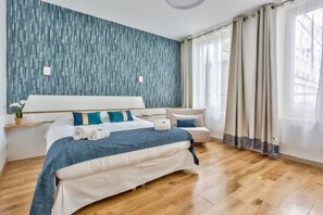 2 chambres, literie de qualité supérieure, fer et planche à repasser