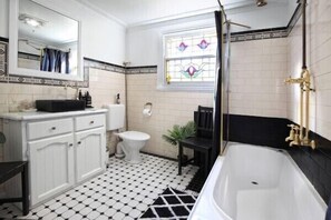 Combined shower/tub, hair dryer, towels, soap