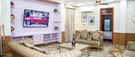Deluxe Apartment | Living area | Smart TV