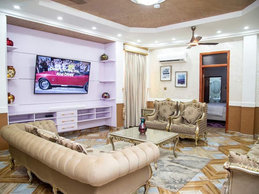 Deluxe Apartment | Living area | Smart TV