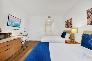 Desk, iron/ironing board, travel crib, WiFi