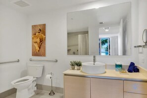 Bathtub, hair dryer, towels