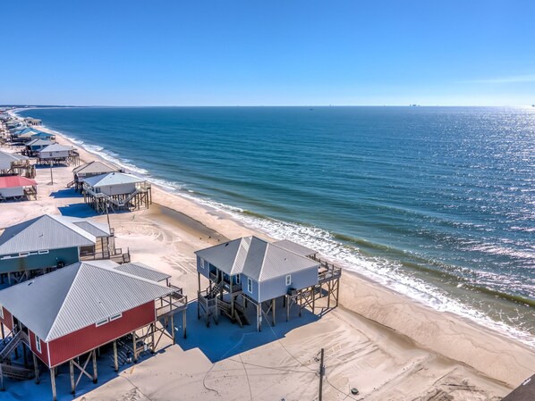 House, 4 Bedrooms | Beach | On the beach - Awake On The Gulf - Gulf Front! Gaze Up At The Stars From Your Large Deck While Listening To The Waves Crash. 4 Bedroom Home by RedAwning (Dauphin Island)
