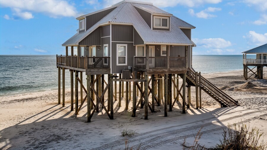 Strand Castle - Gulf Front! An Ideal Layout With Game Room, Small Private Pool, And Roof Top Crow's Nest! 4 Bedroom Home by RedAwning