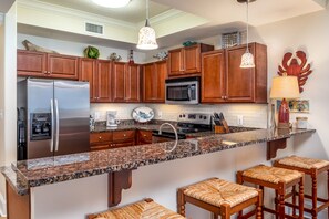 Private kitchen - Calm Seas - Holiday Isle #119 - Tremendous Views, A Beautiful Gulf Front Pool, A Heated Indoor Pool, Jacuzzi, Steam Room, And Gulf View Fitness Center. 2 Bedroom Condo by RedAwning (Dauphin Island)