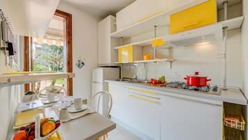 Family Apartment, 2 Bedrooms, Microwave (Cinzia Apartment Front Beach- Pool,) | Private kitchen | Fridge, microwave, stovetop, cookware/dishes/utensils