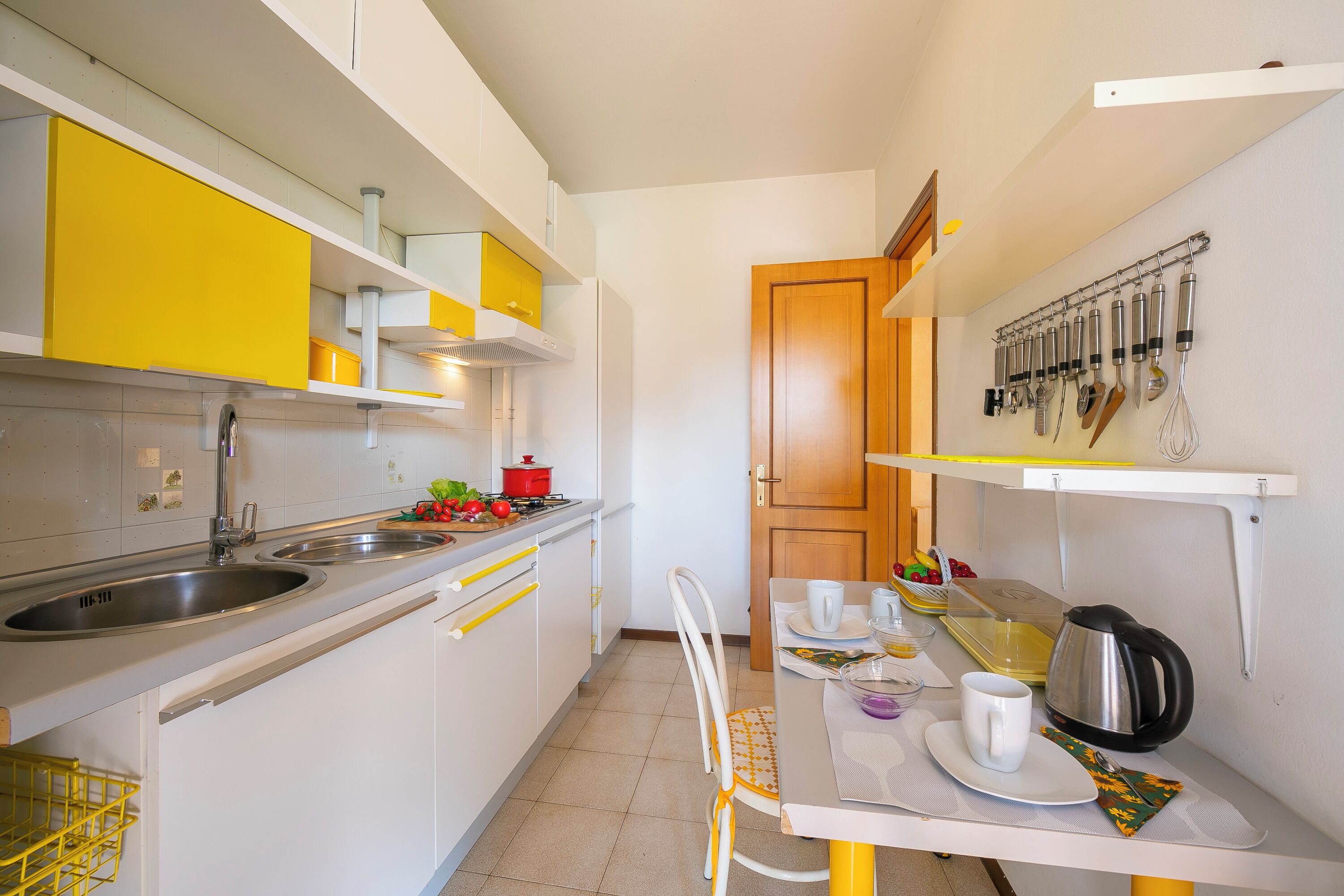 Family Apartment, Multiple Bedrooms (Cinzia Apartment Front Beach) | Private kitchen | Fridge, microwave, stovetop, coffee/tea maker