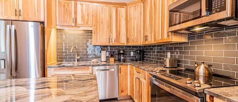 Microwave, stovetop, dishwasher, coffee/tea maker