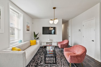 The main living area has playful modern decor to give it a welcoming feeling!