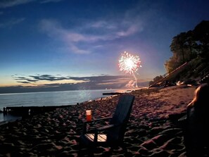 On the beach, sun loungers, beach towels