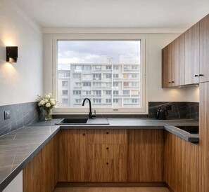 Fridge, microwave, stovetop, coffee/tea maker