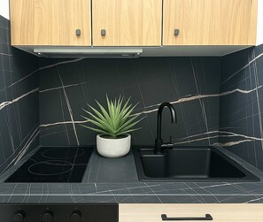 Fridge, microwave, stovetop, coffee/tea maker