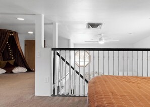 1 bedroom, desk, iron/ironing board, travel crib