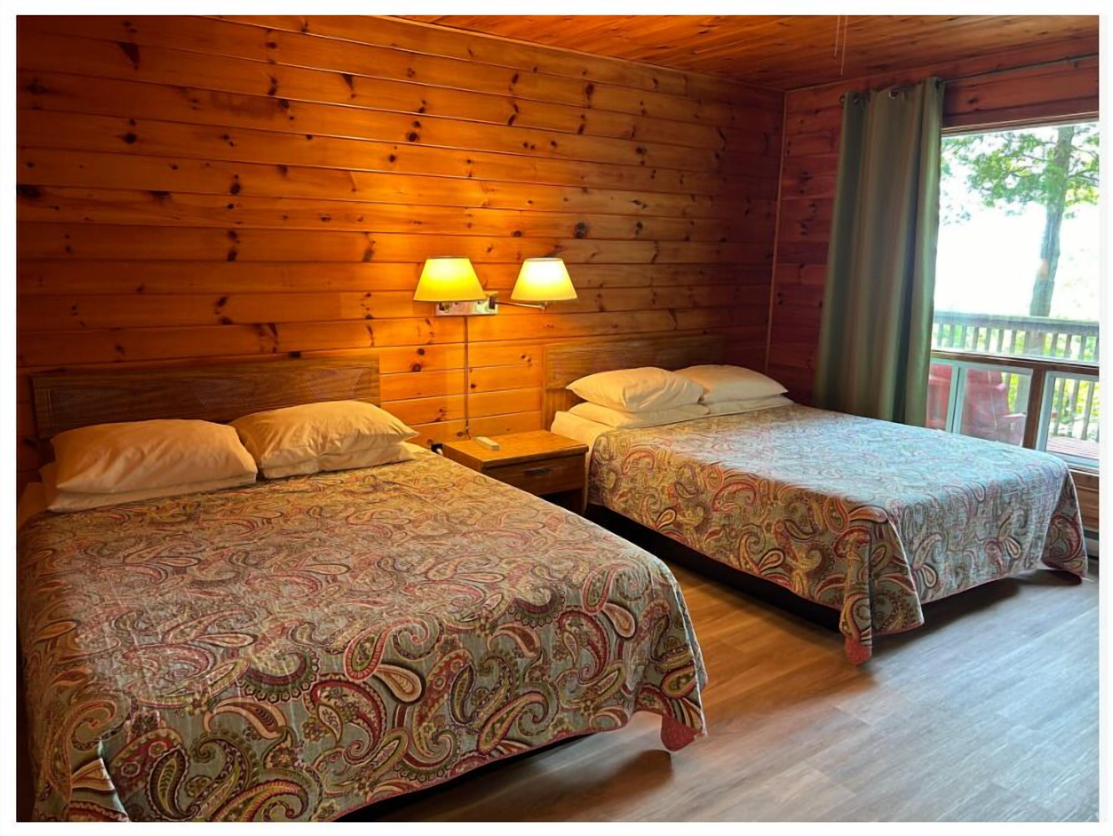 Motel Room M1 (Ramp Access) | Blackout drapes, bed sheets