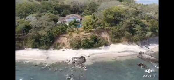 On the beach, sun loungers, beach towels