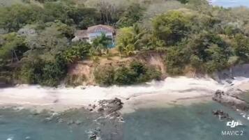 On the beach, sun-loungers, beach towels
