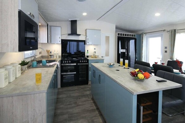 Cabin | Private kitchen | Fridge, microwave, oven, stovetop - Superior 6 Berth Holiday Home in Suffolk, (Saxmundham)