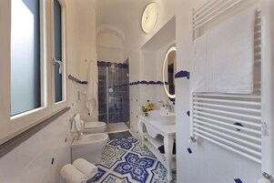Luxury Room | Bathroom | Shower, rainfall showerhead, designer toiletries, hair dryer