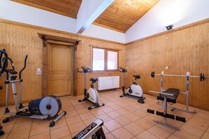 Work out in style with a range of exercise equipment, including an elliptical machine, stationary bike, and treadmill.