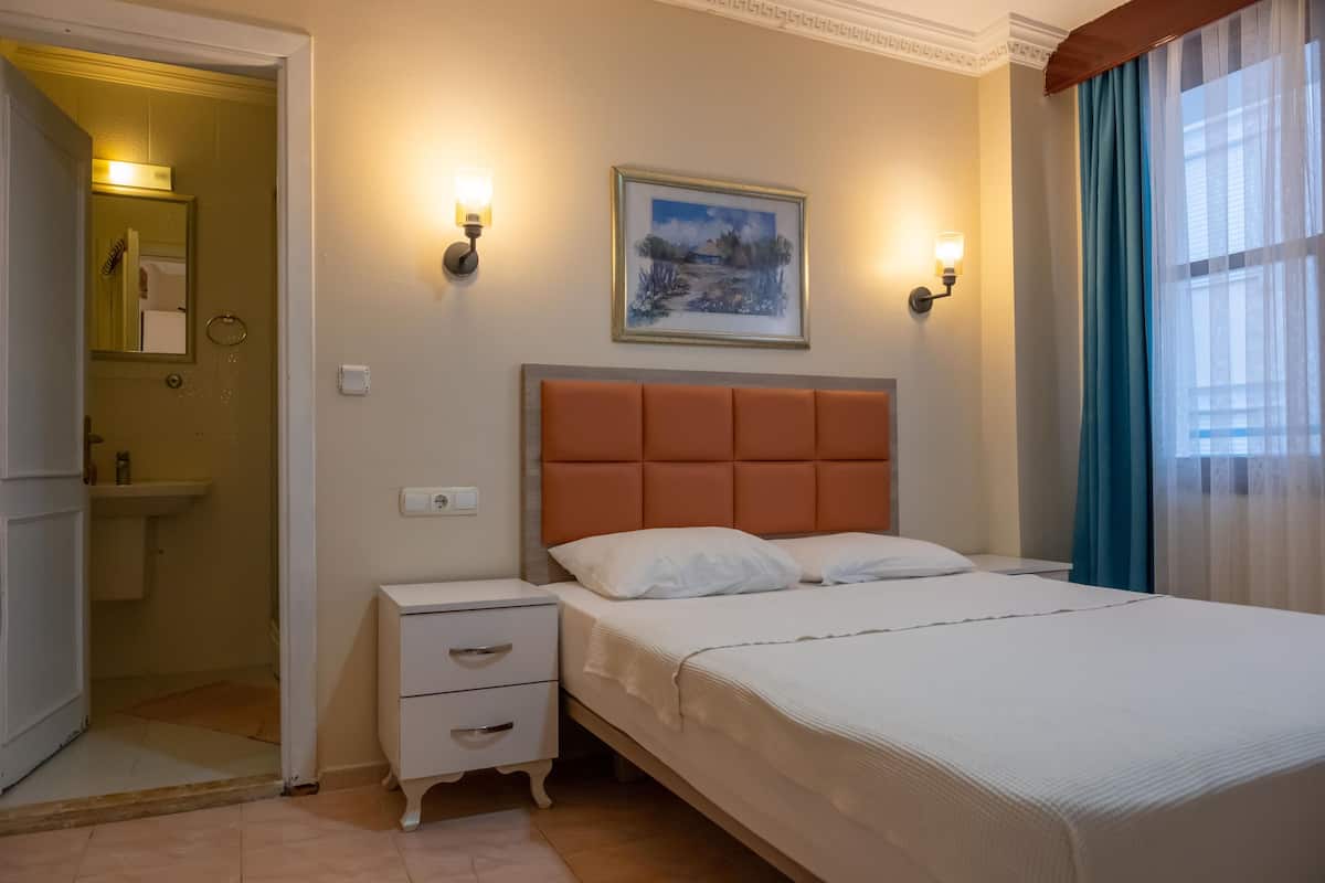 Family Room | 1 bedroom, iron/ironing board, free WiFi, bed sheets