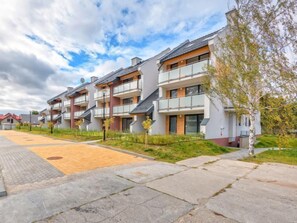 Enjoy comfortable living in this spacious residence with a balcony and large windows.