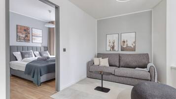 Suite XL with sofa bed | Living area | 50-inch Smart TV with satellite channels, TV