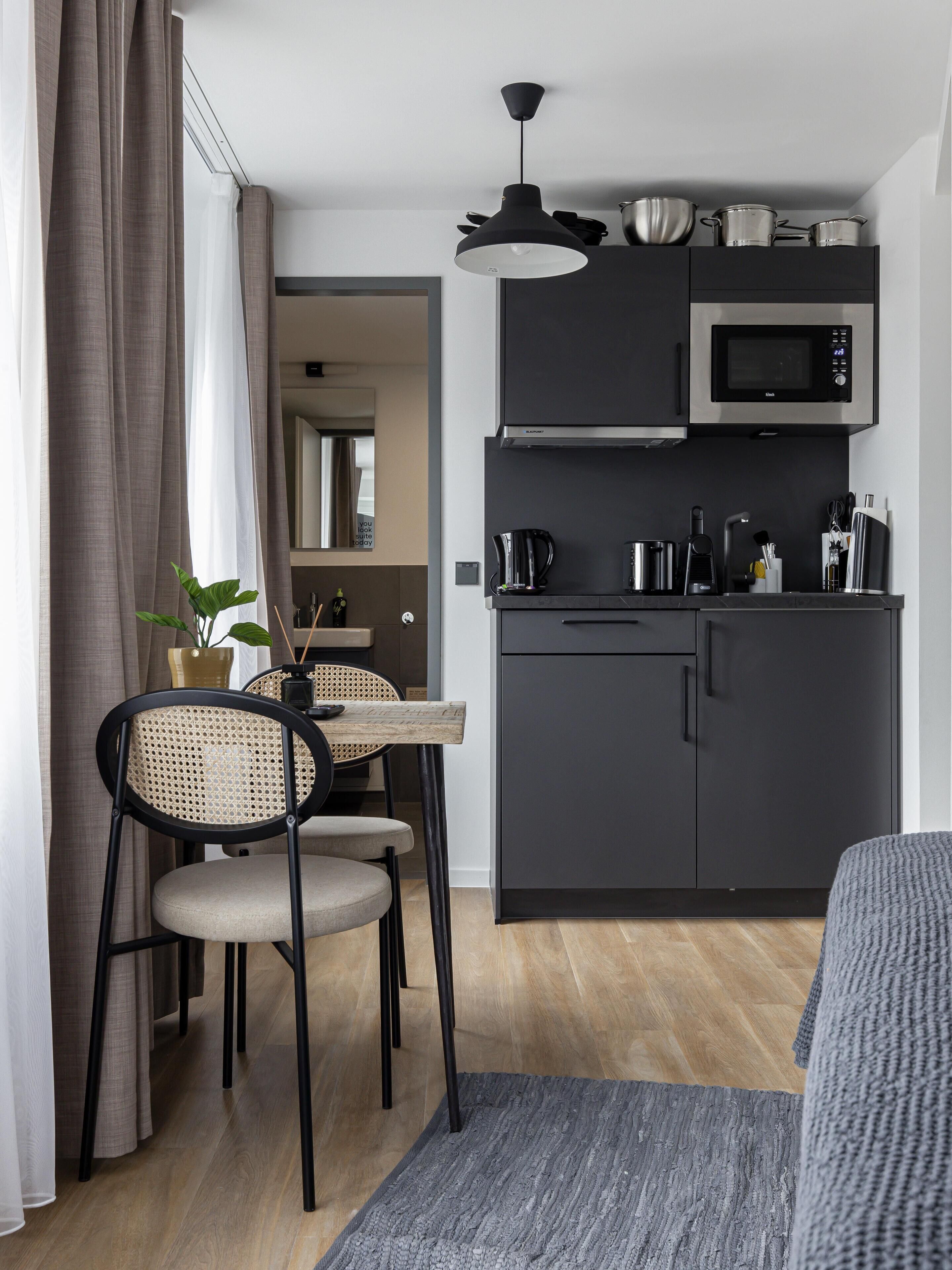 Suite L | Living area | 50-inch Smart TV with satellite channels, TV