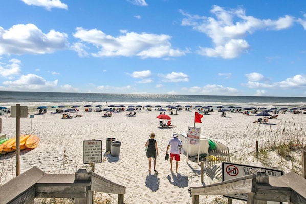 On the beach, sun loungers, beach towels