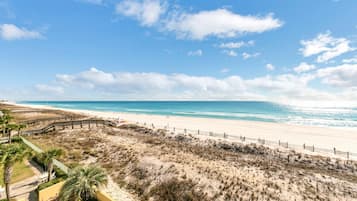 On the beach, sun-loungers, beach towels