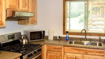 Fridge, coffee/tea maker, cookware/dishes/utensils