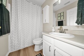 Bathtub, hair dryer, towels