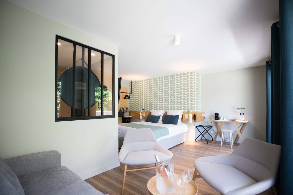 family room | select comfort beds, in-room safe, blackout curtains, free wifi