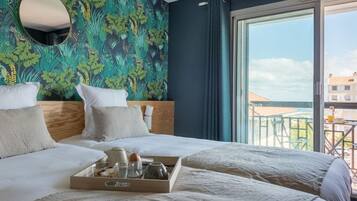 Camas Select Comfort y caja de seguridad en la habitación