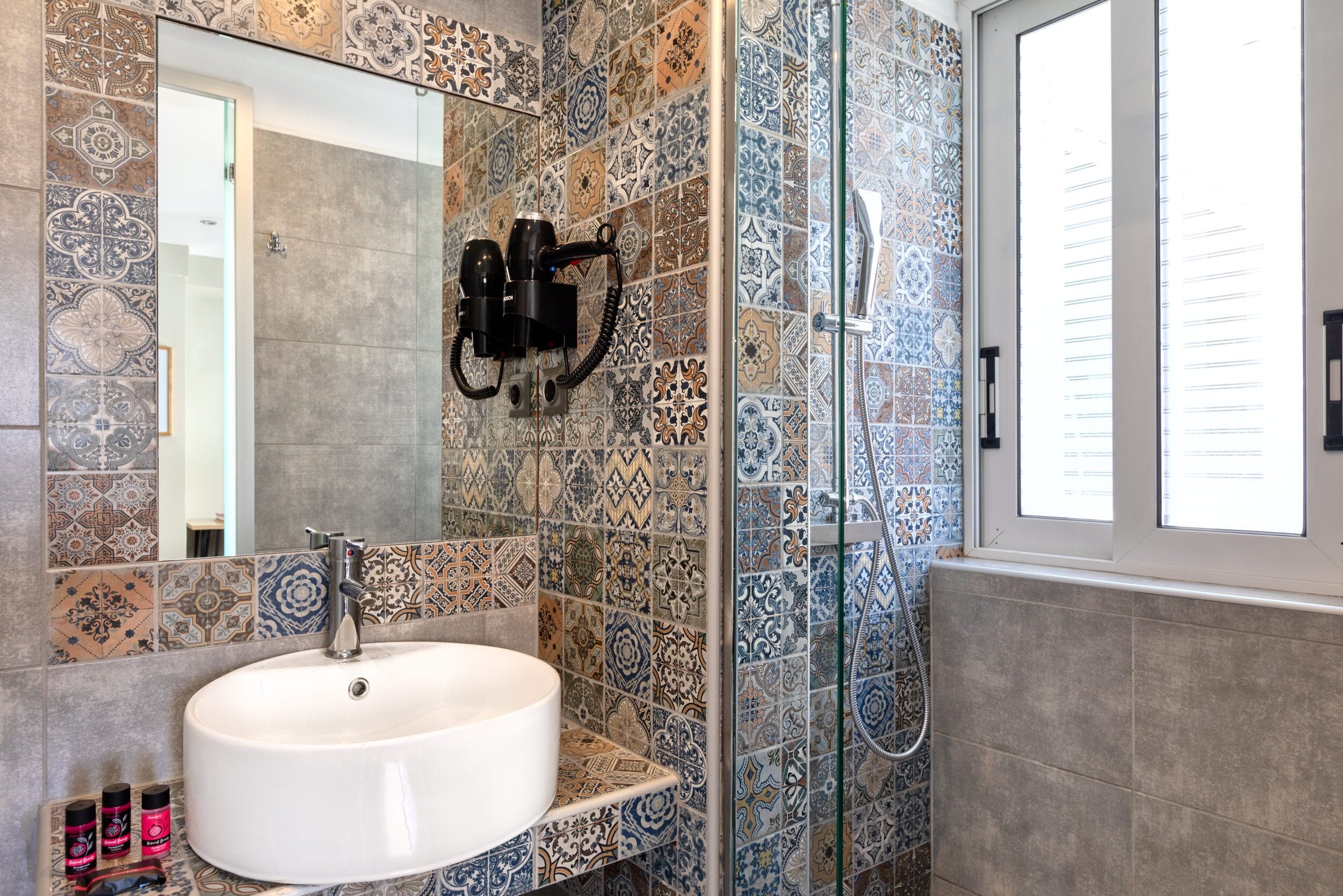 shower, rainfall showerhead, hair dryer, towels