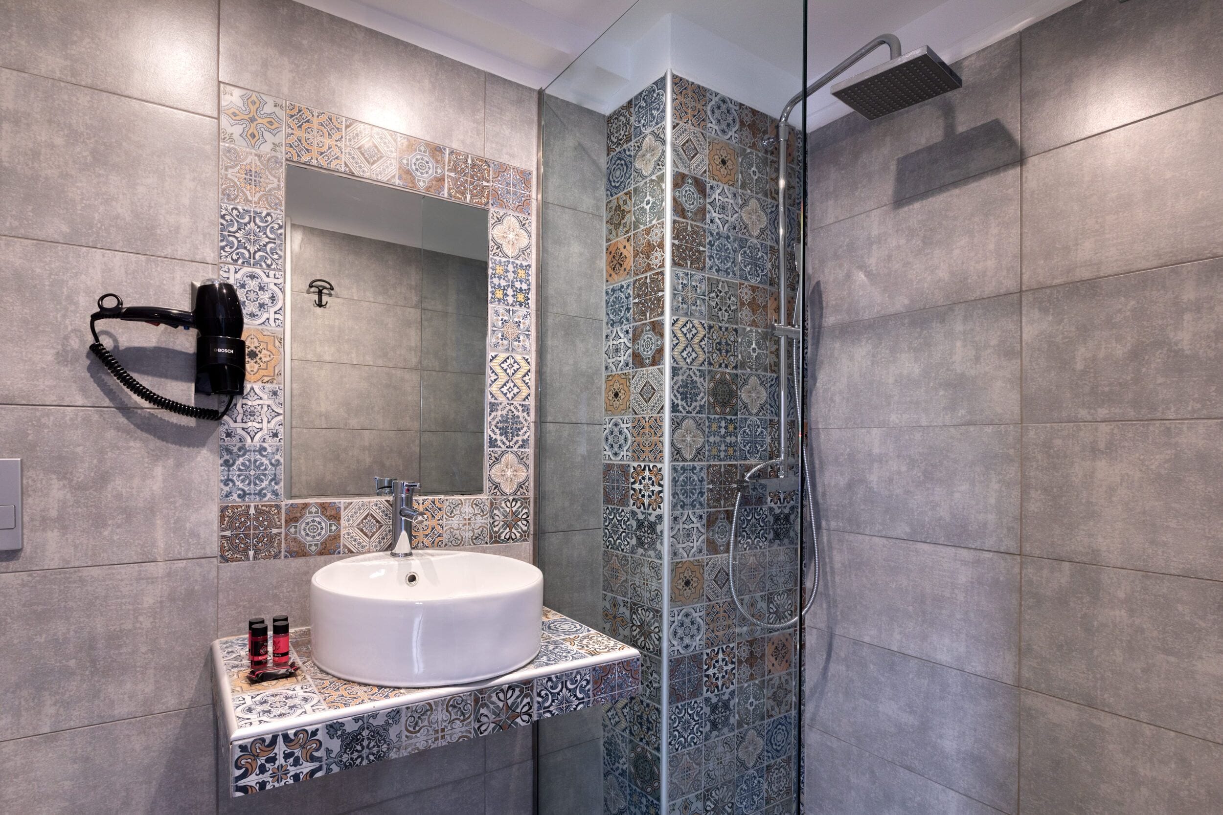 shower, rainfall showerhead, hair dryer, towels