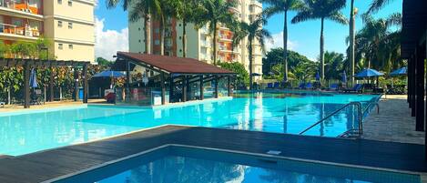 Club Apartment, Pool Access | Pool | 2 outdoor pools, pool umbrellas